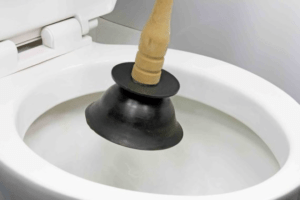 A plunger is used to unblock a blocked toilet
